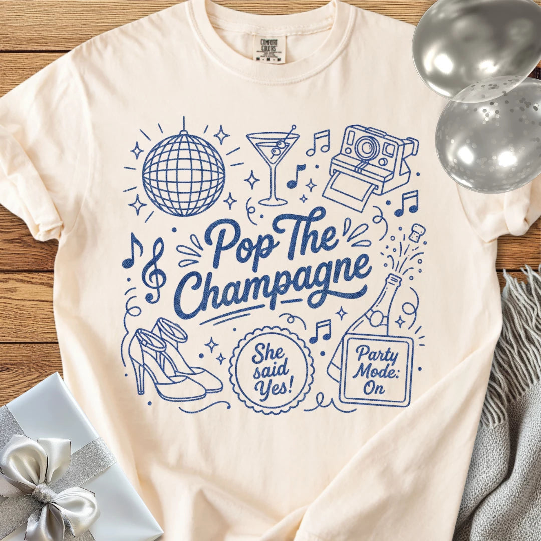 Pop the Champagne, She Said Yes -  Premium Engagement T-Shirt