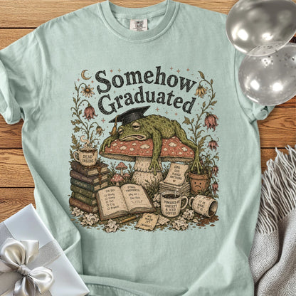 Somehow Graduated - Premium Graduation T-Shirt