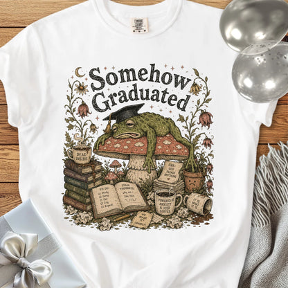 Somehow Graduated - Premium Graduation T-Shirt