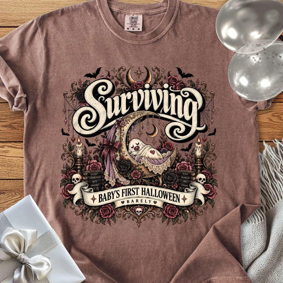 Surviving Baby's First Halloween, Barely - Premium Halloween New Parent T-Shirt