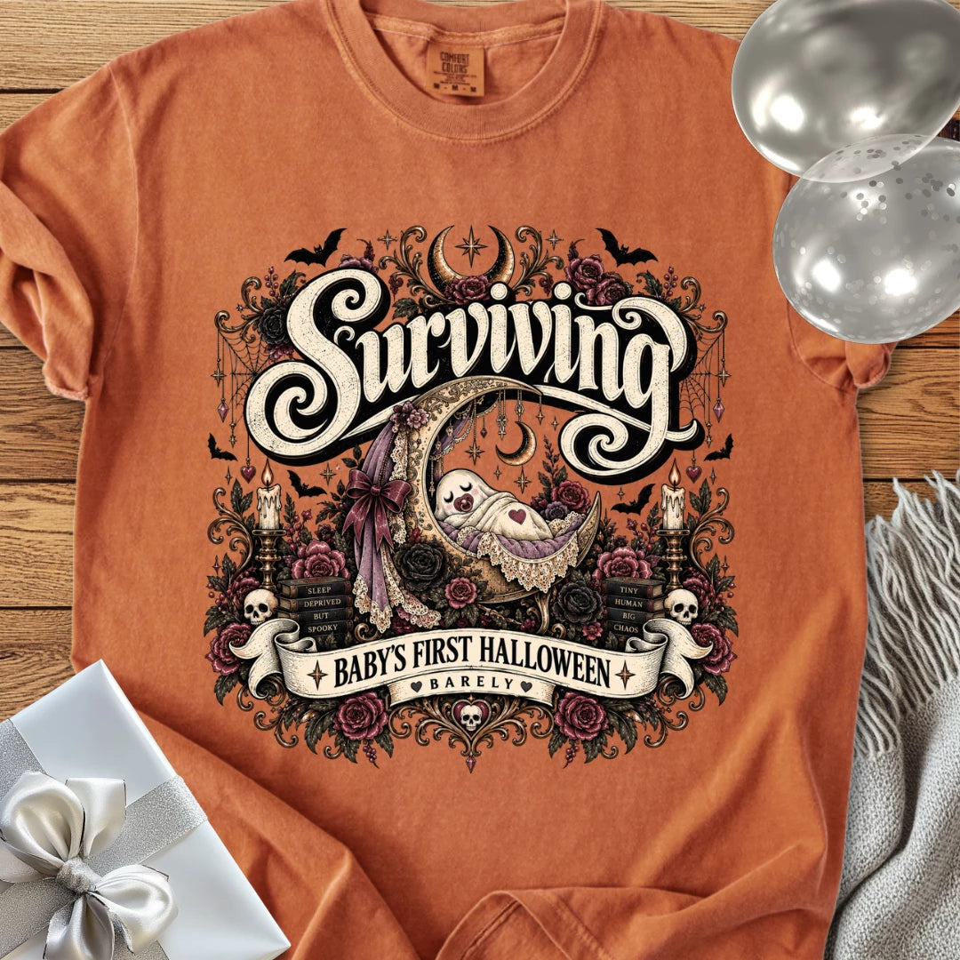 Surviving Baby's First Halloween, Barely - Premium Halloween New Parent T-Shirt