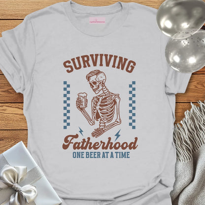 Surviving Fatherhood One Beer at a Time - Parenting T-Shirt
