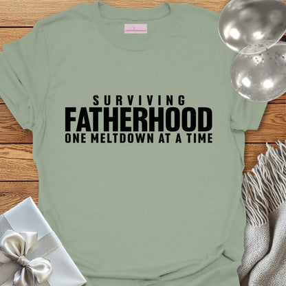 Surviving Fatherhood One Meltdown at a Time - Parenting T-Shirt