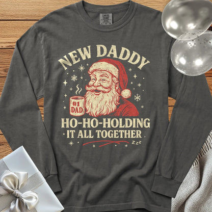 New Daddy, Ho-Ho-Holding it All Together - Premium Christmas Long Sleeve T-Shirt - Pepper